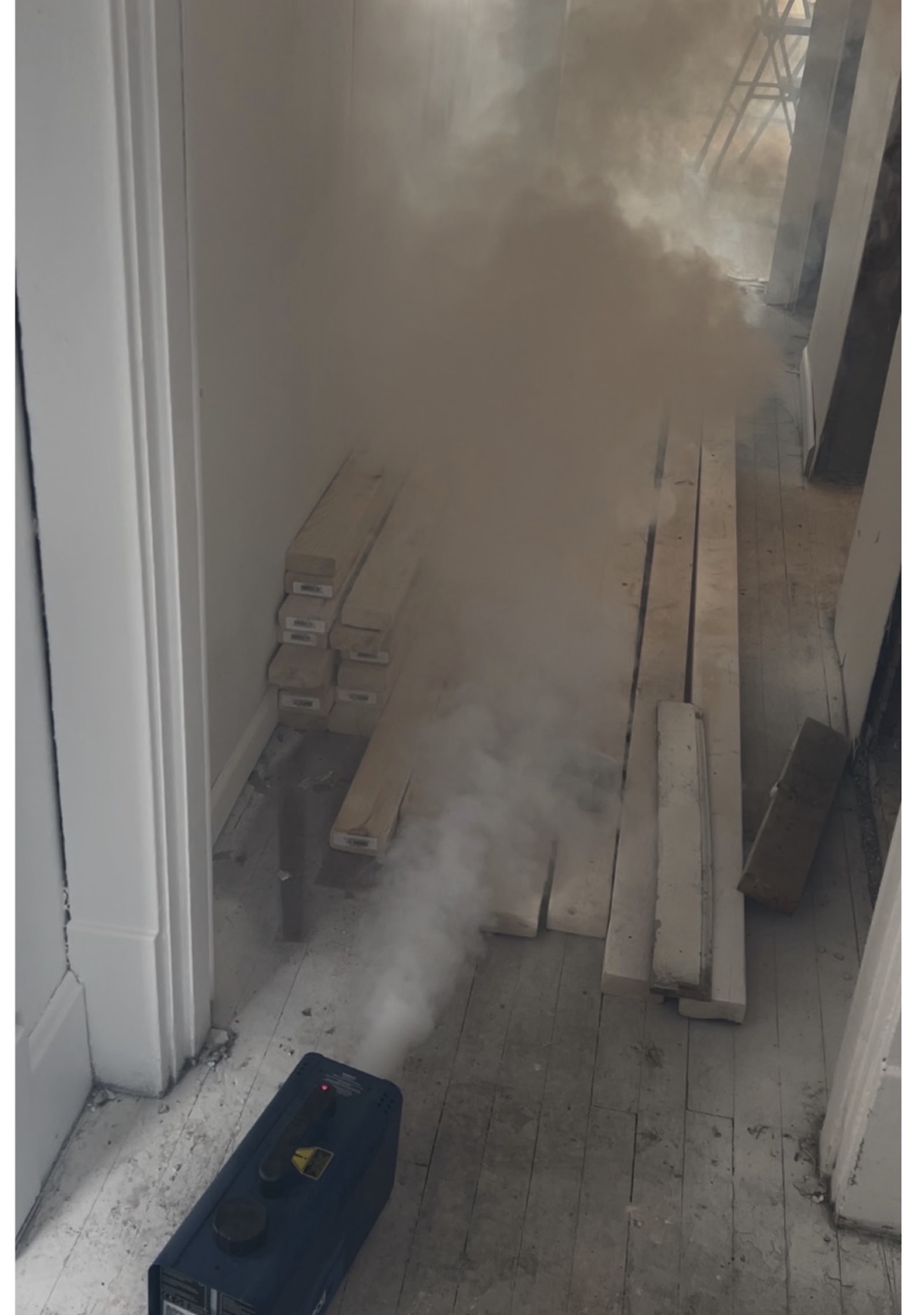 Specialized fogging machine distributing lightweight sanitizing fog throughout a home during whole-home sanitization